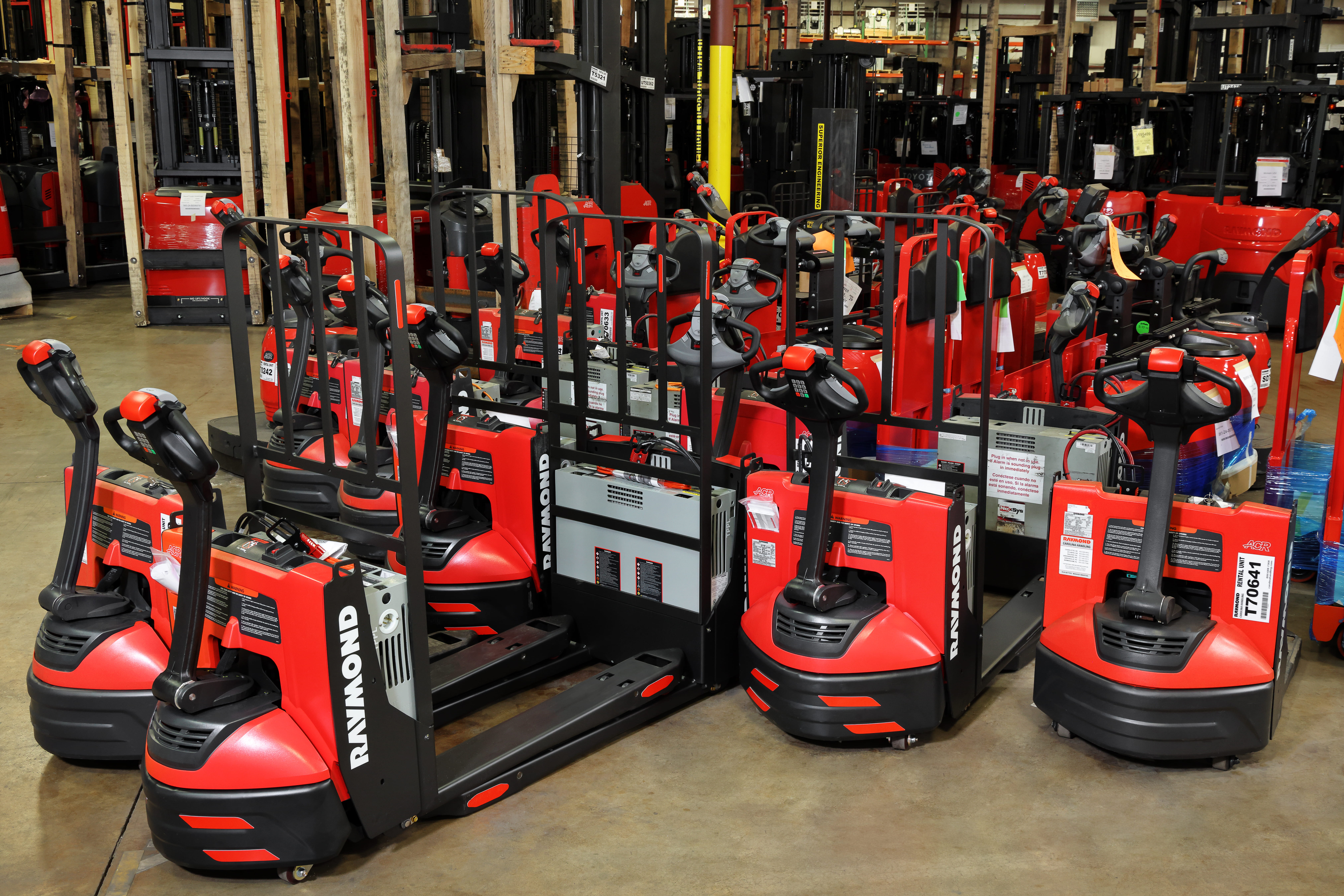 Fleet of Raymond 8210 motorized pallet jacks